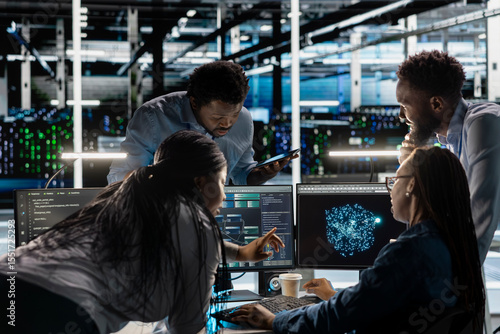 Obraz na plátně Data center engineering team implements AI virtualization frameworks to optimize server clusters