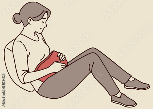 Pregnant woman relaxing with a heating pad, for wellness websites