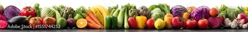 Colorful Arrangement of Fresh Fruits and Vegetables Displayed on a Dark Background for Healthy Eating and Nutrition Concepts