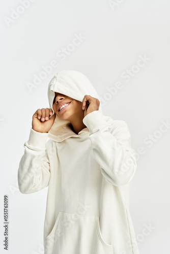 Fotografía Stylish little boy in cheerful outfit enjoying playful moments with a big smile