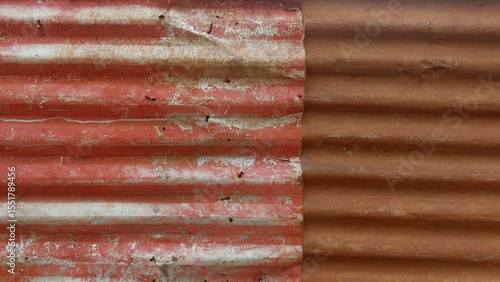Rusty corrugated iron sheet metal creating a textured background for construction fence