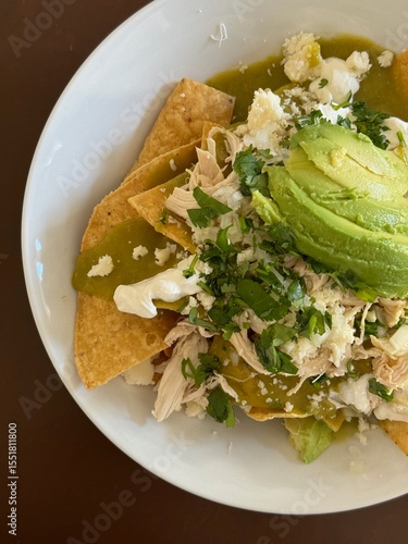Chilaquiles with Shredded Chicken, Avocado, and Green Sauce Overhead