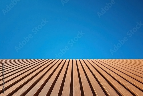 Modern Architectural Design with Wooden Panels and Clear Blue Sky
