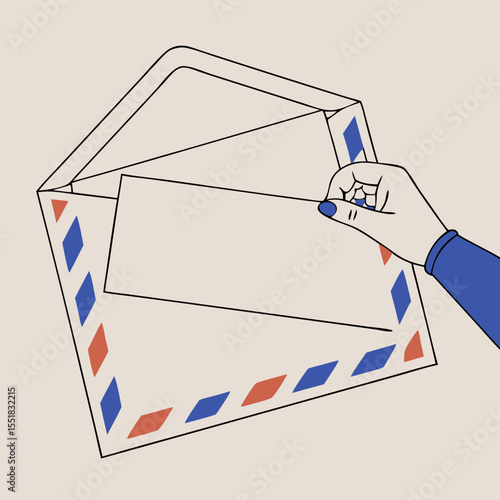Hand holding letter while inserting it into open envelope for Marketing  