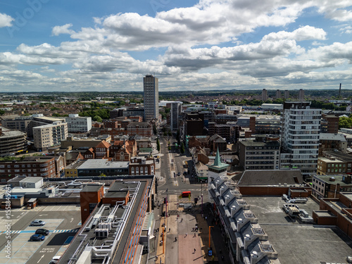 Leicester cityscape showing roads, buildings and cloudy sky