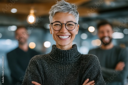 With teamwork and innovation at the forefront, a diverse business team works collaboratively in a modern office setting to devise a comprehensive strategy