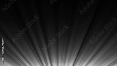 Abstract black and white light rays bursting outward from the bottom creating a dramatic effect