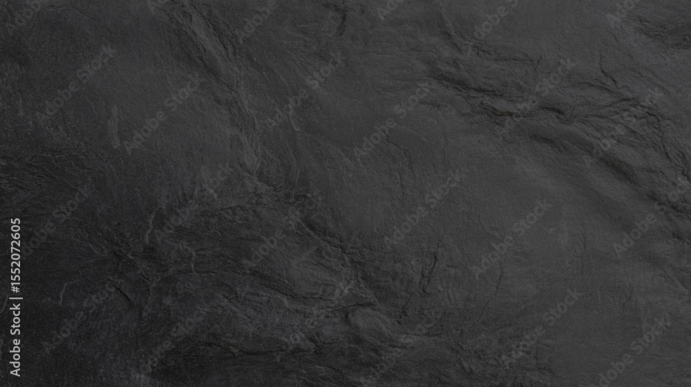 Fototapeta premium Dark gray slate background showing rough textured surface