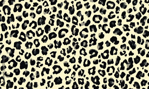 Leopard print pattern, seamless repeating pattern, vector illustration, flat design, simple shapes, black and white with subtle hints of pale yellow.