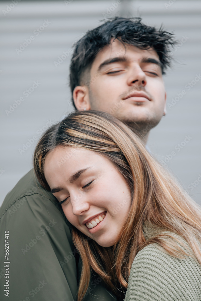 Fototapeta premium couple in love hugging on the street outdoors
