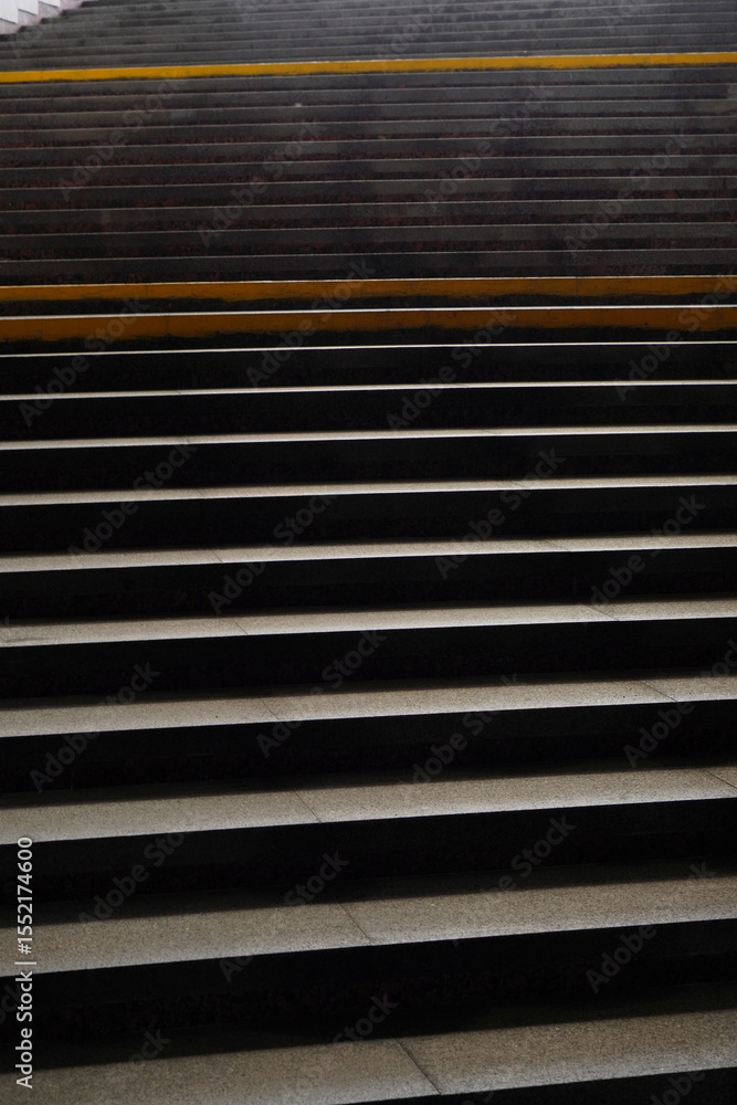 Fototapeta premium Stairs in a dark underground pedestrian crossing