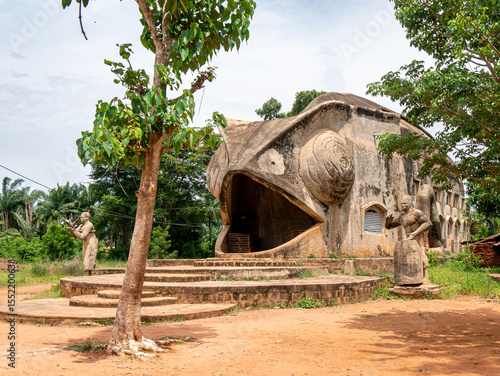 Chameleon-shaped Vodun temple near Abomey, Benin, on a cloudy afternoon 2