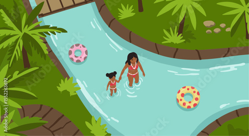 Children at the water park walking through river with swim floats  