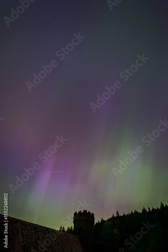 Northern lights over the silhouette of Derwent Dam