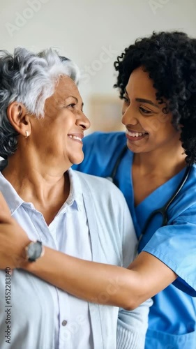 Caring nurse embracing elderly woman, providing support, healthcare professional helping senior patient, cheerful and hopeful