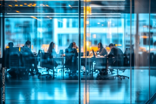 Blurred background of a bright, modern office interior with people working  