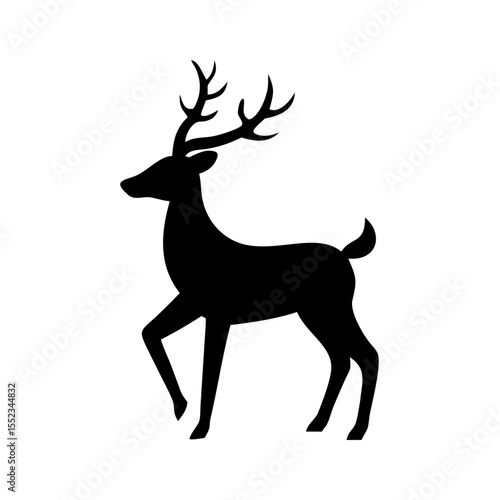 Silhouette of a majestic stag with prominent antlers standing gracefully in a side profile view