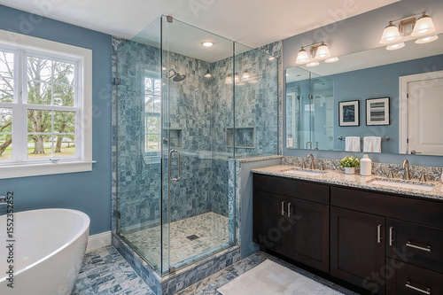 Sleek modern bathroom featuring frameless glass shower