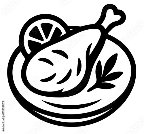 A plate of food with a piece of chicken and a lemon wedge