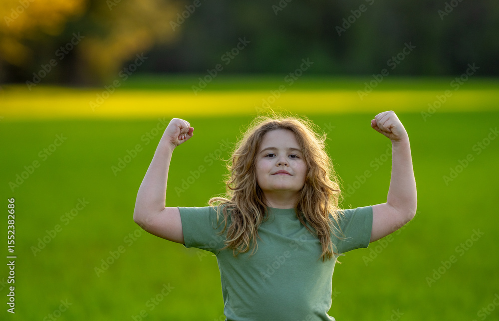 Close-up portrait of kid in summer. Kids face. Summer portrait of happy child. Child face in park. Portrait of cheerful kid outdoors. Fun face of child. Child enjoying summer. Summer vibes. Close-up portrait of kid in summer. Kids face. Summer portrait of happy child. Child face in park. Portrait of cheerful kid outdoors. Fun face of child. Child enjoying summer. Summer vibes.