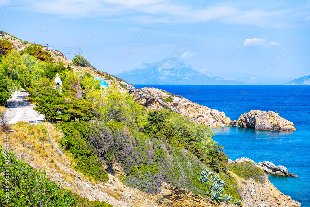 custom made wallpaper toronto digitalAgios Kirykos coastline view of Church of Analipsi The Ascension Greek christian orthodox religion at Therma, Ikaria island, Greece blue zone