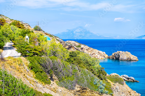 Wallpaper Mural Agios Kirykos coastline view of Church of Analipsi The Ascension Greek christian orthodox religion at Therma, Ikaria island, Greece blue zone Torontodigital.ca