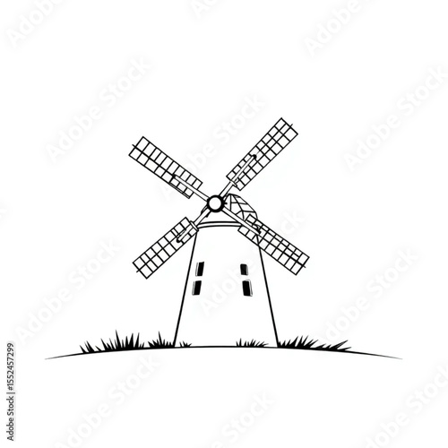 A windmill turning slowly in a gentle summer breez...
