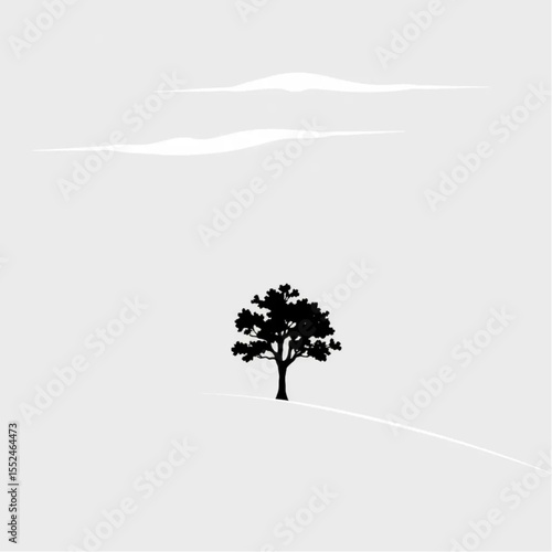 A lone tree standing on a hill under a stormy sky
