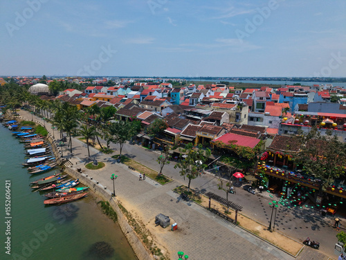 Wallpaper Mural Aerial drone shot of Hoi An’s historic architecture, colorful rooftops, and traditional streets. Ideal for content related to Vietnam, Southeast Asia, heritage, and tourism Torontodigital.ca