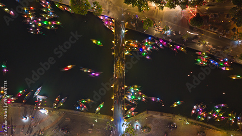 Wallpaper Mural Aerial view of Hoi An old town or Hoian ancient town in evening. Royalty high-quality free stock image of Hoai river and boat tour night traffic. One of the most popular touristic destination Torontodigital.ca