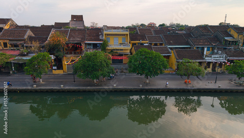 Wallpaper Mural Peaceful morning in Hoi An ancient town with quiet streets, yellow walls, and soft sunlight. Tranquil atmosphere in Vietnam's historic UNESCO site Torontodigital.ca