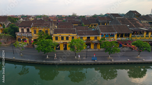 Wallpaper Mural Aerial drone shot of Hoi An’s historic architecture, colorful rooftops, and traditional streets. Ideal for content related to Vietnam, Southeast Asia, heritage, and tourism Torontodigital.ca