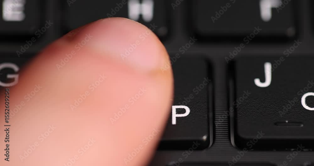 press keyboard with English and Russian letters, the black keyboard in the layout of letters in several languages, closeup press keyboard with English and Russian letters, the black keyboard in the layout of letters in several languages, closeup