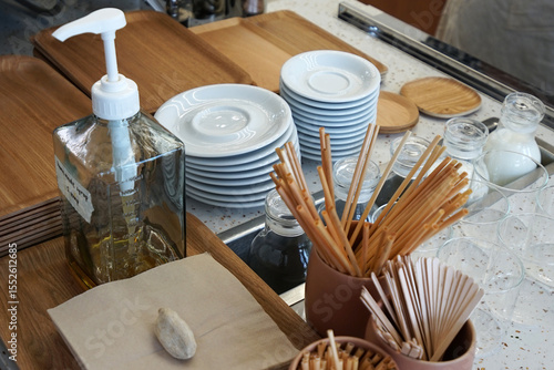 Cuadro en lienzo Complimentary self serve table stand of napkin tissue paper, sugar and straw