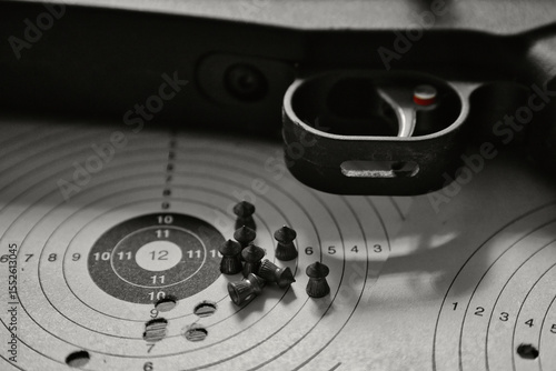 Pistol trigger target close-up sport sports shooter marksman hobby defense firearm rifle ammunition protection bullets hunting air rifle silencer diabolos pellets competition target 
