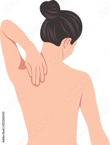 A woman rubs her sore shoulder