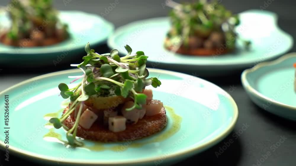 Elegant appetizer: microgreens atop diced ham and potato on a crispy base. Elegant appetizer: microgreens atop diced ham and potato on a crispy base.