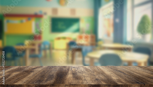Wooden tabletop with blurred background of colorful primary classroom. Ideal for educational design or school mockups.
