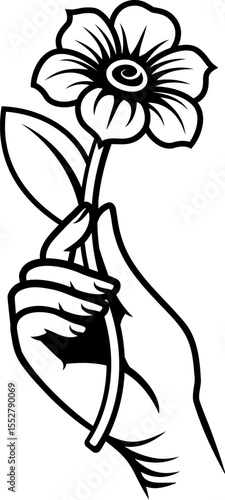 A hand holding a flower des...