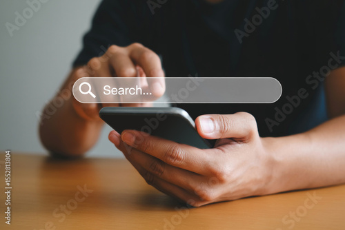 Person using smartphone searching online mobile search bar