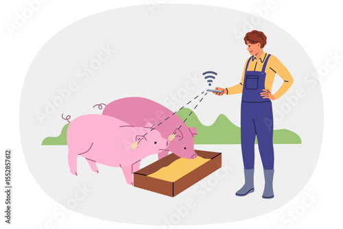 Farmer controls smart livestock farm via phone, standing near pigs with WiFi chips in ears. Innovative technologies in livestock and agriculture thanks to iot sensors for raising piglets