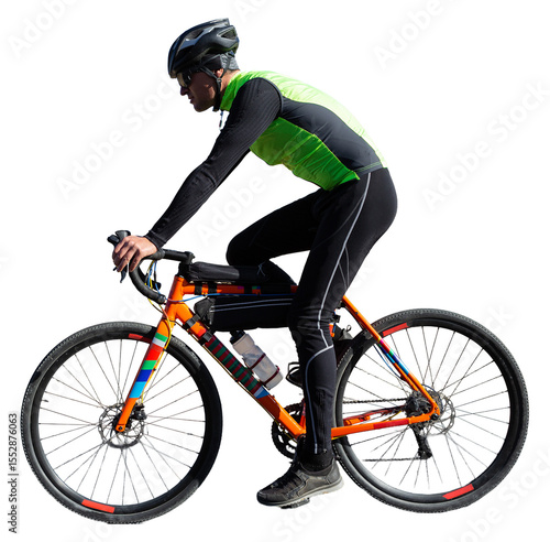 Cyclist riding bicycle on road against clear sky