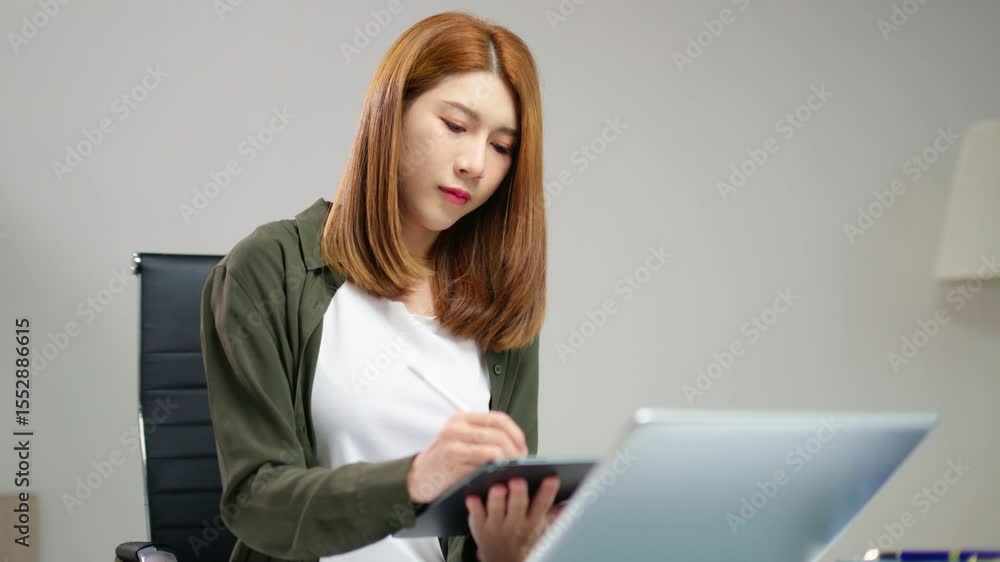 Business woman using tablet and laptop for doing math finance on an office desk, tax Business woman using tablet and laptop for doing math finance on an office desk, tax
