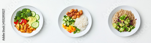 Minimal flat lay of nutritious meals on three plates over clean white background