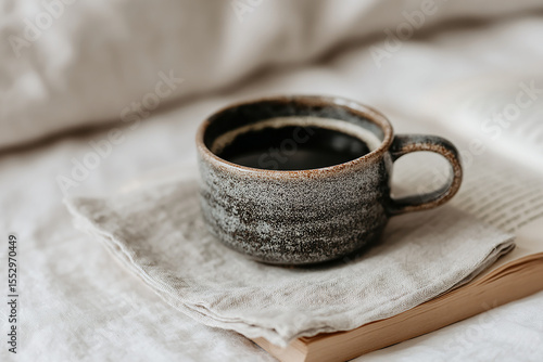 Wallpaper Mural Still life in boho style of a artisan cup of coffee next to a book Torontodigital.ca