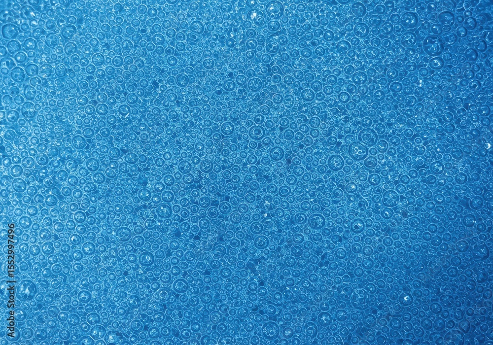 Blue bubbly texture, water or liquid with many small air bubbles Blue bubbly texture, water or liquid with many small air bubbles