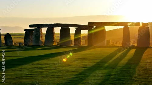 Majestic Sunrise Over Ancient Stone Circle Surrounded by Rolling Hills and Vibrant Sky at Dusk