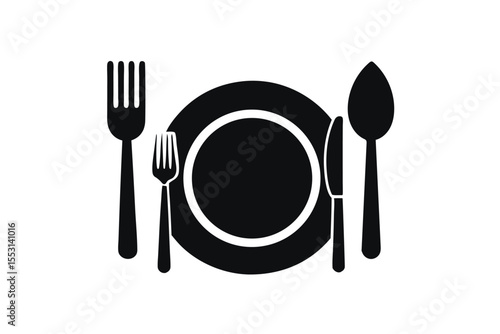 A monochrome plate is centrally located with cutlery around it for a clean look