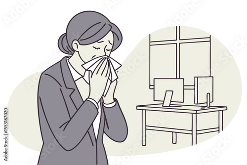 In an office setting, a businesswoman sneezes into a tissue, her face showing irritation and discomfort.