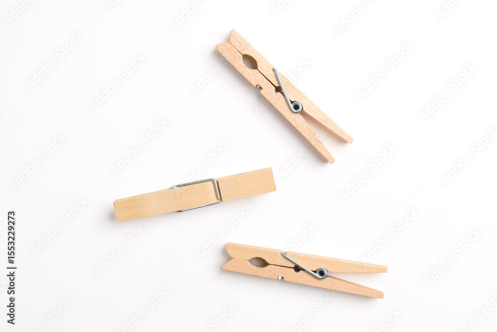 Wooden clothes pin isolated on white background. Top view, flat lay Wooden clothes pin isolated on white background. Top view, flat lay